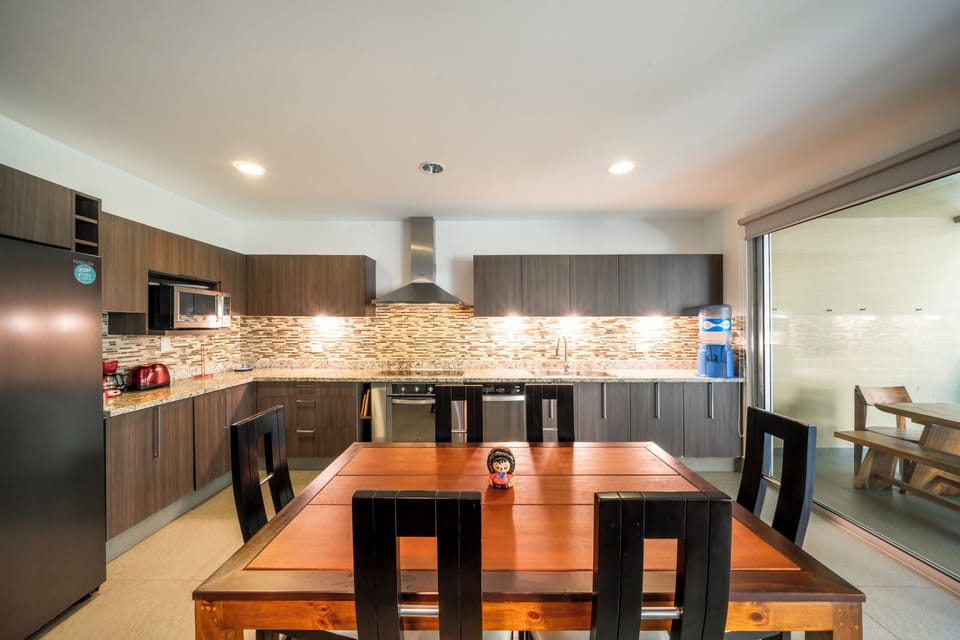 Deluxe Condo, Balcony, Pool View | Private kitchen | Toaster