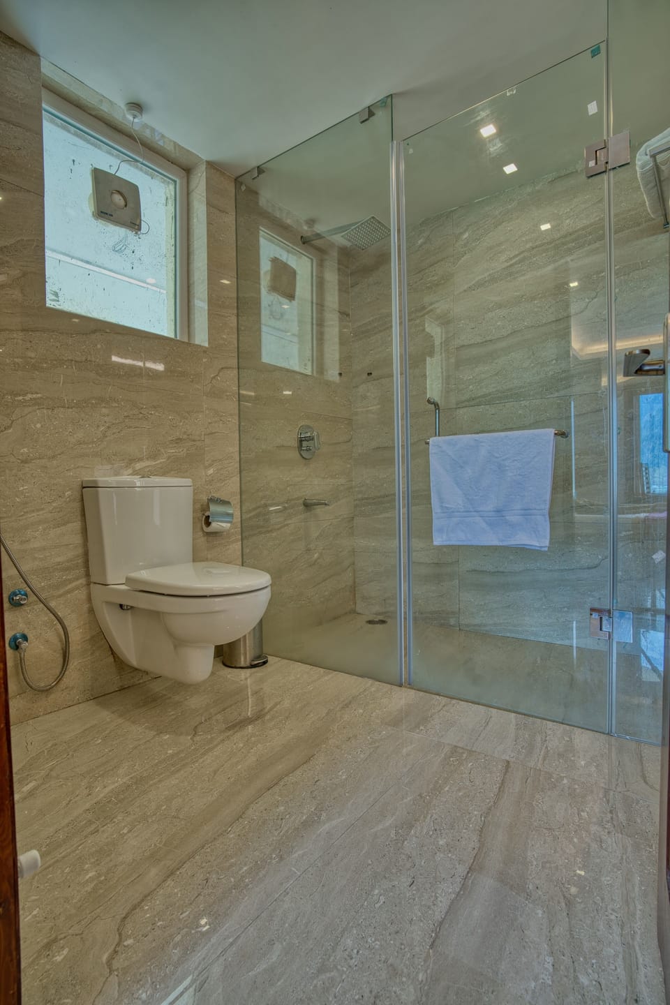 Shower, free toiletries, slippers, towels