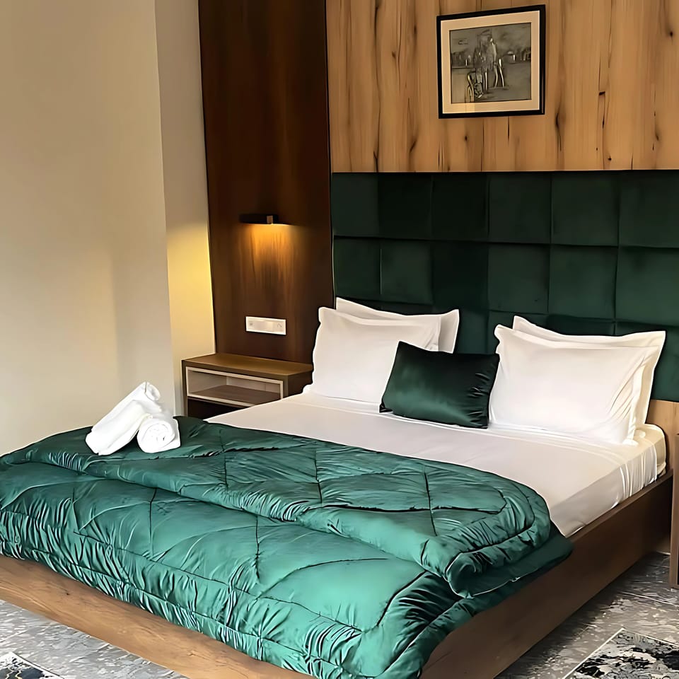 Deluxe Suite, City View | In-room safe, desk, laptop workspace, WiFi (free)