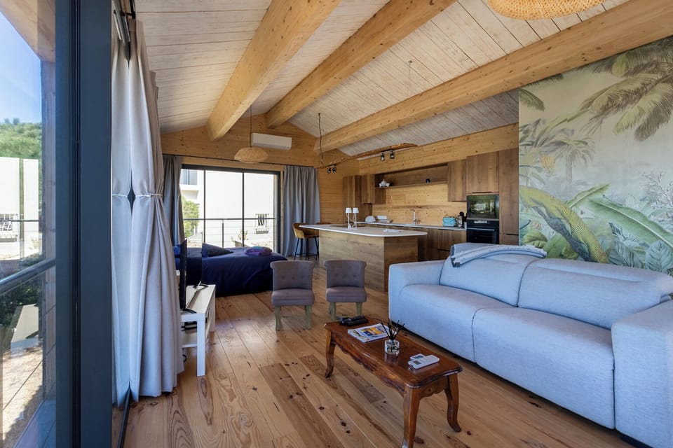 Comfort Villa, Sea View | Living area | Flat-screen TV