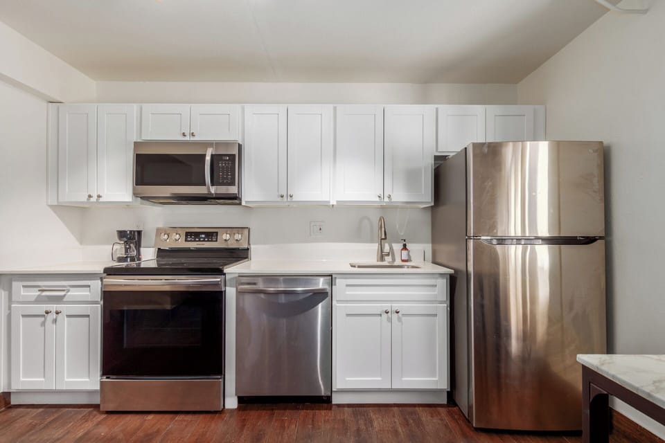 Stovetop, dishwasher, coffee/tea maker, cookware/dishes/utensils