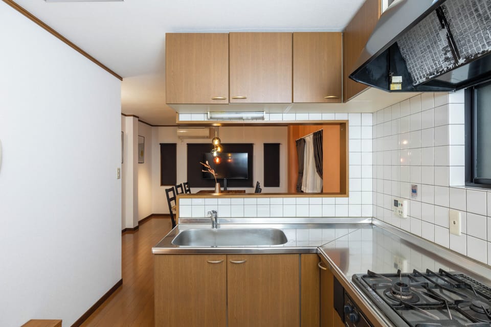 Executive Condo, Balcony | Private kitchen | Electric kettle