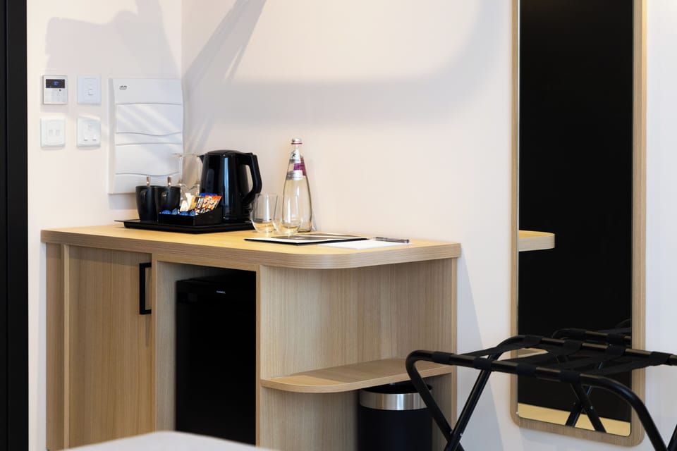 Double Room, Balcony, City View | Living area | TV