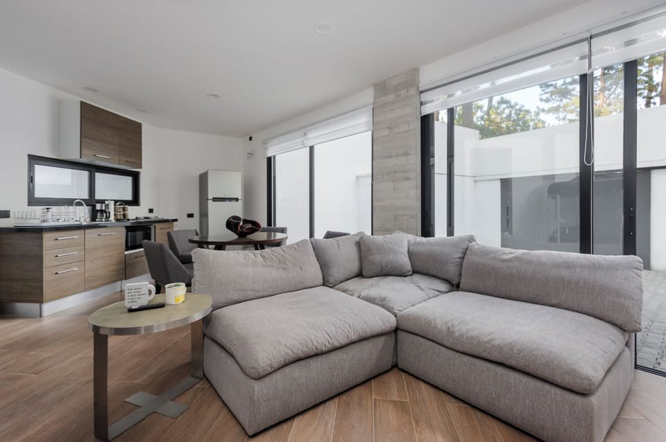 Family House, Garden View | Living area | 50-inch flat-screen TV with digital channels