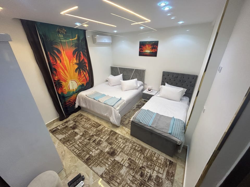 Standard Triple Room | Pillowtop beds, minibar, soundproofing, iron/ironing board