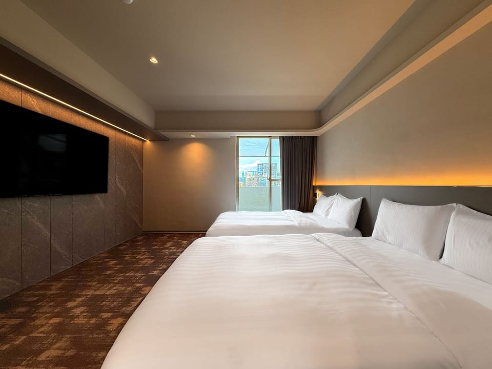 Superior Quadruple Room | Down comforters, free minibar, blackout drapes, free WiFi