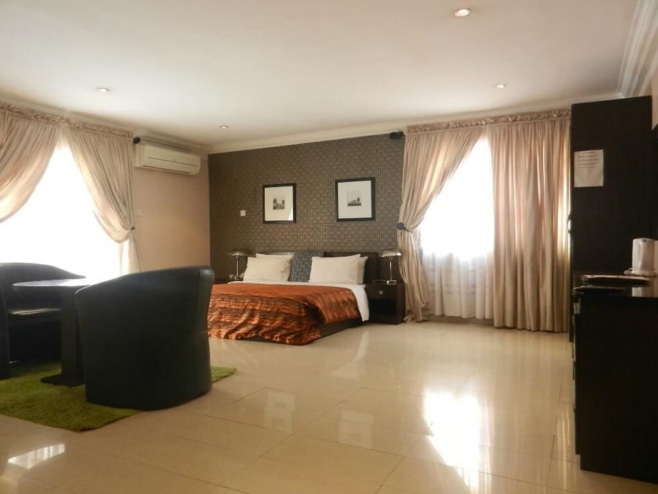 Executive Room, Balcony, City View | Desk, laptop workspace, free WiFi
