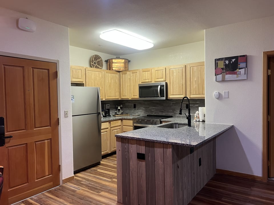 Condo, 2 Bedrooms | Private kitchen | Coffee/tea maker, fridge, oven, electric kettle