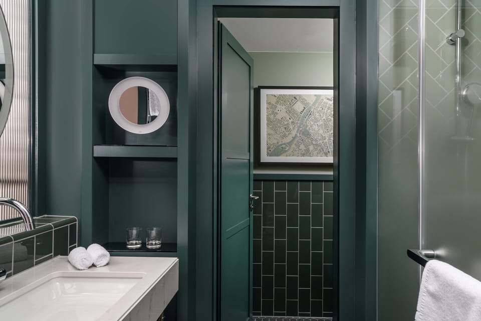 Rainfall showerhead, designer toiletries, hair dryer, bathrobes