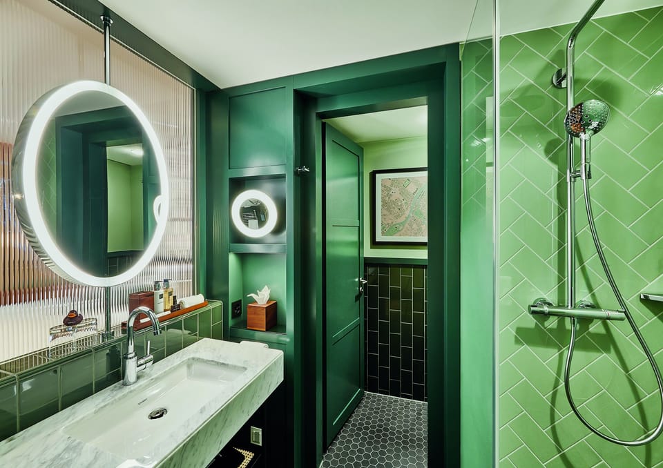 Superior Double Room, Kitchenette | Bathroom | Rainfall showerhead, designer toiletries, hair dryer, bathrobes