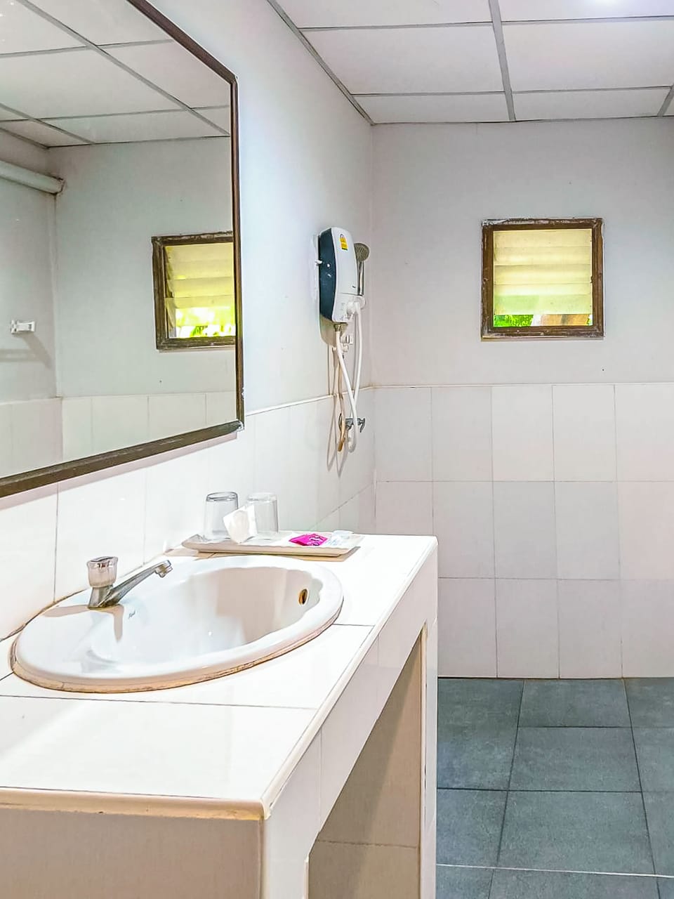 Hair dryer, towels, soap, shampoo