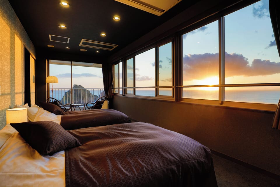 Executive Quadruple Room, Non Smoking, Ocean View | Down comforters, in-room safe, free WiFi