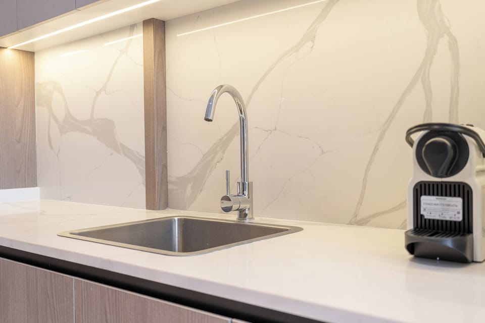 Deluxe Studio, Balcony, City View | Private kitchen | Fridge, microwave, oven, stovetop