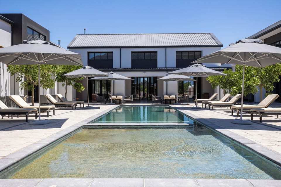 Indoor pool, outdoor pool, open 8:00 AM to 6:00 PM, pool umbrellas