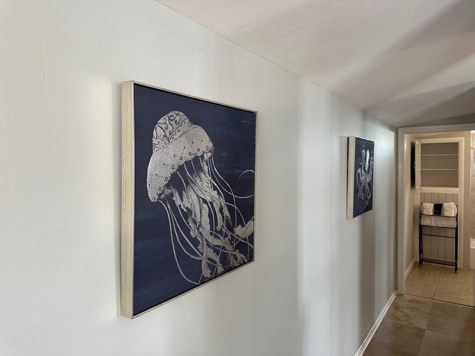 Palmetto Palm 1 bedroom Suite, 2 Queen Beds, living room, Kitchen, 2nd Floor Stair Access | Individually decorated, individually furnished, iron/ironing board