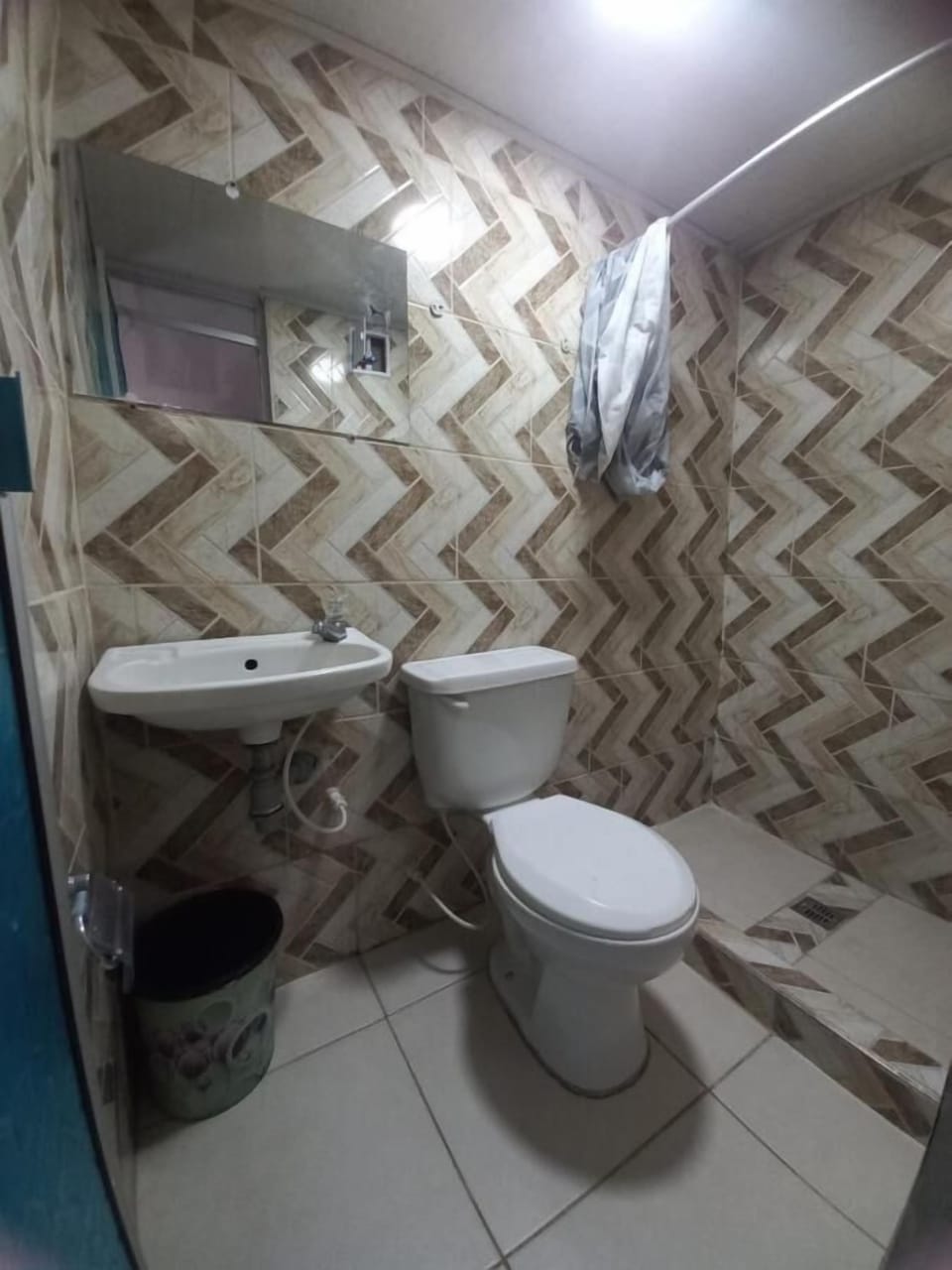 Shower, towels, soap, toilet paper