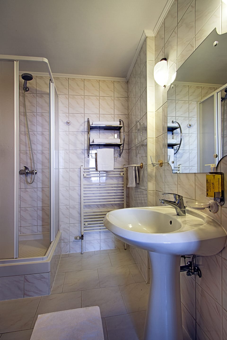 Deep soaking tub, designer toiletries, hair dryer, towels