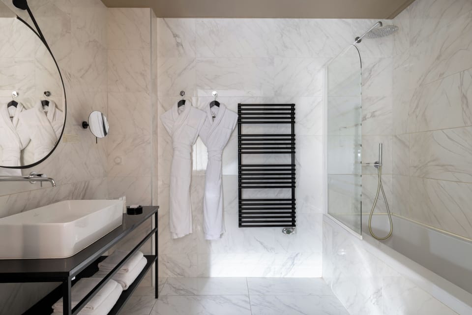 Superior Double Room | Bathroom | Designer toiletries, hair dryer, slippers, towels