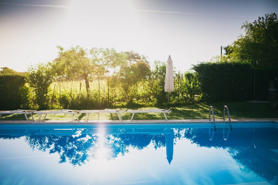 Outdoor pool, open 10:00 AM to 7:30 PM, pool umbrellas, sun loungers