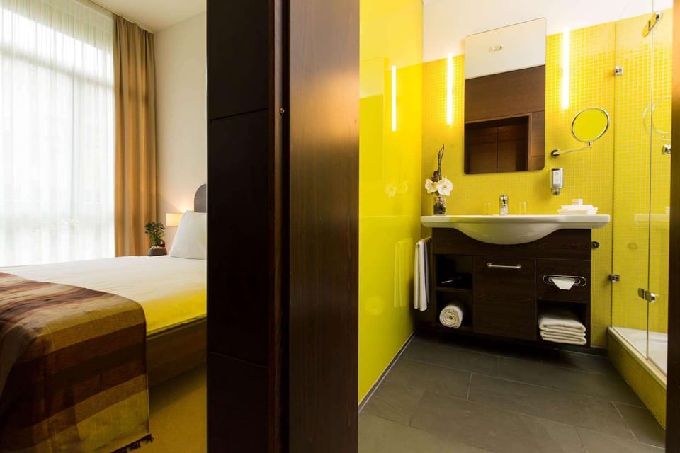 Shower, eco-friendly toiletries, hair dryer, towels