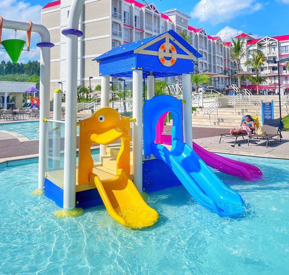 Indoor pool, 5 outdoor pools, open 8:00 AM to 10:00 PM, pool umbrellas