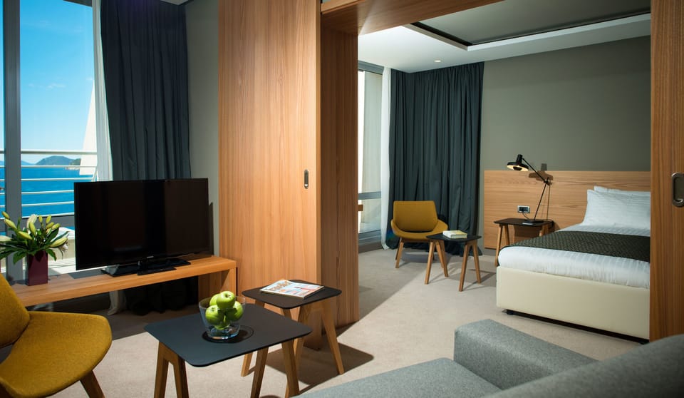 Flat-screen TV, pay movies