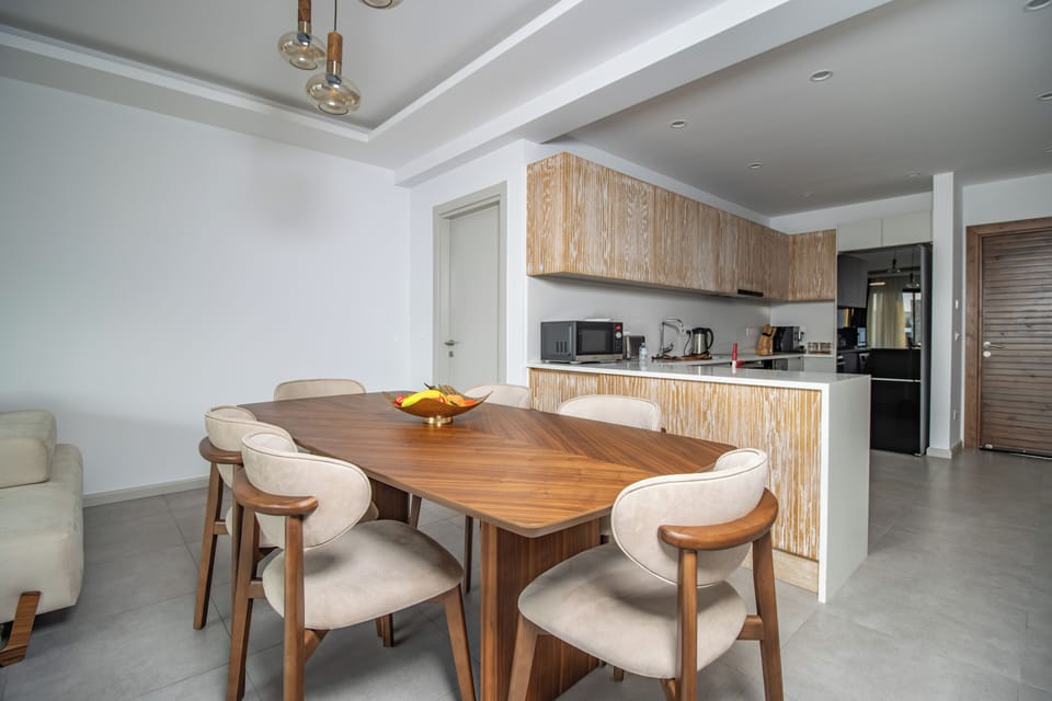 Comfort Condo, Garden View | Private kitchen | Full-size fridge, oven, stovetop, cookware/dishes/utensils