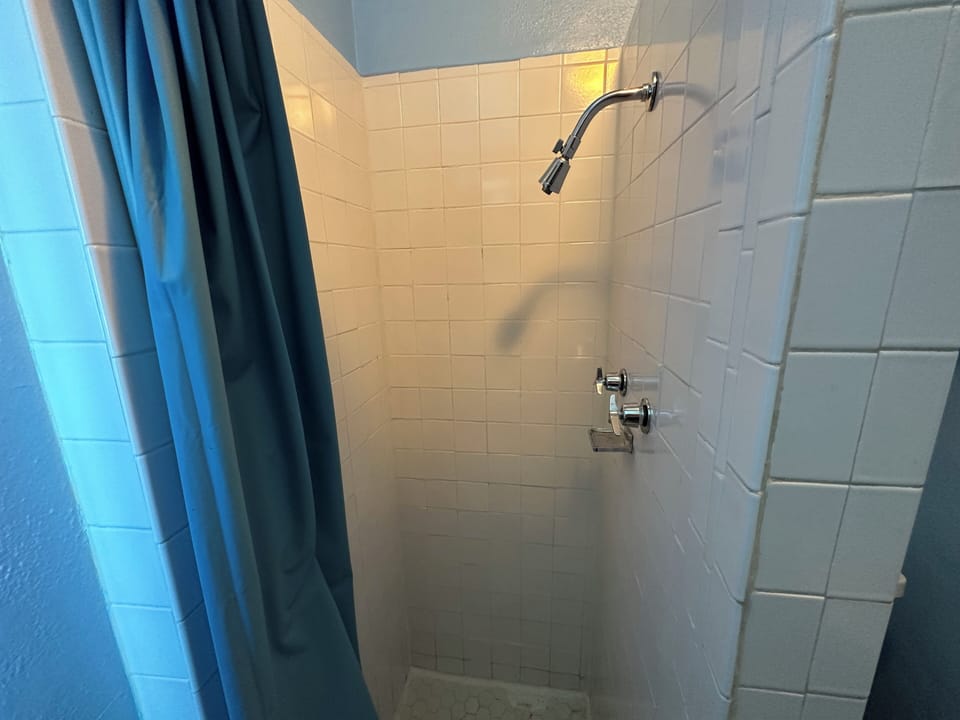Shower, towels, soap, shampoo