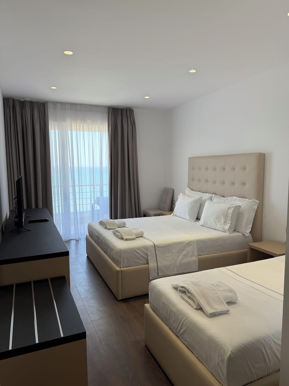 Deluxe Triple Room, Sea View | In-room safe, desk, soundproofing, iron/ironing board