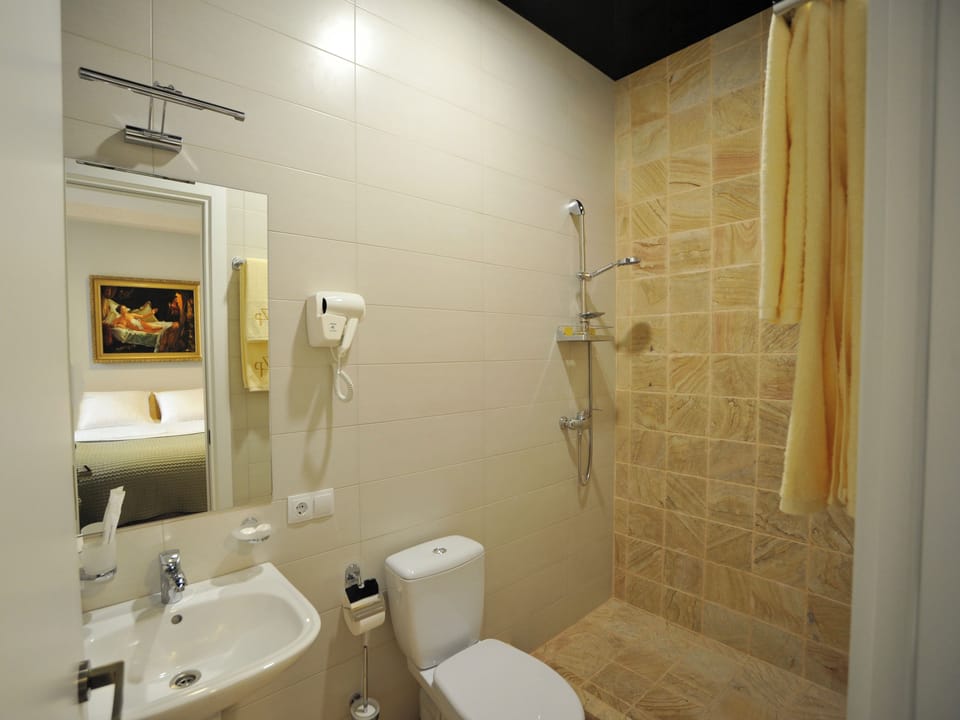 Standard Double Room, City View | Bathroom | Shower, hair dryer, slippers, towels