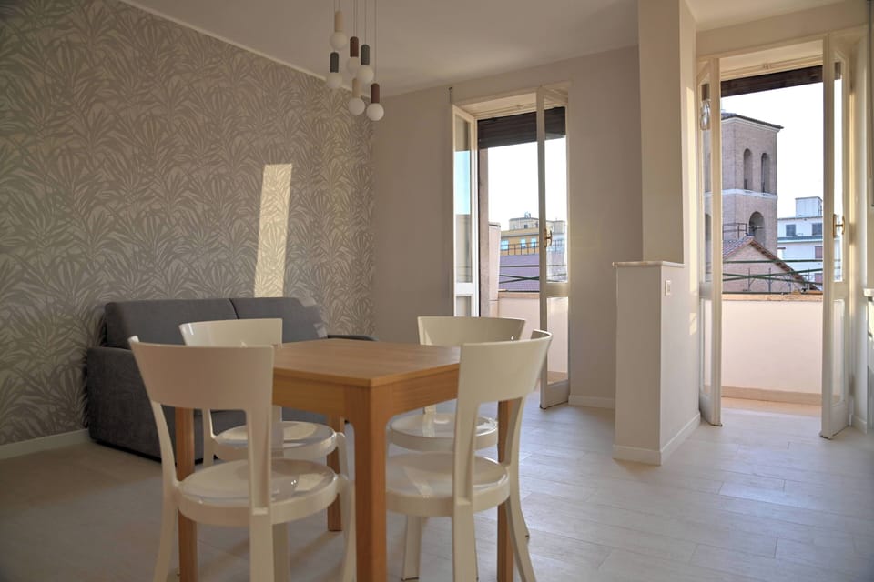 Apartment, Balcony, City View | Living area | 32-inch flat-screen TV with cable channels