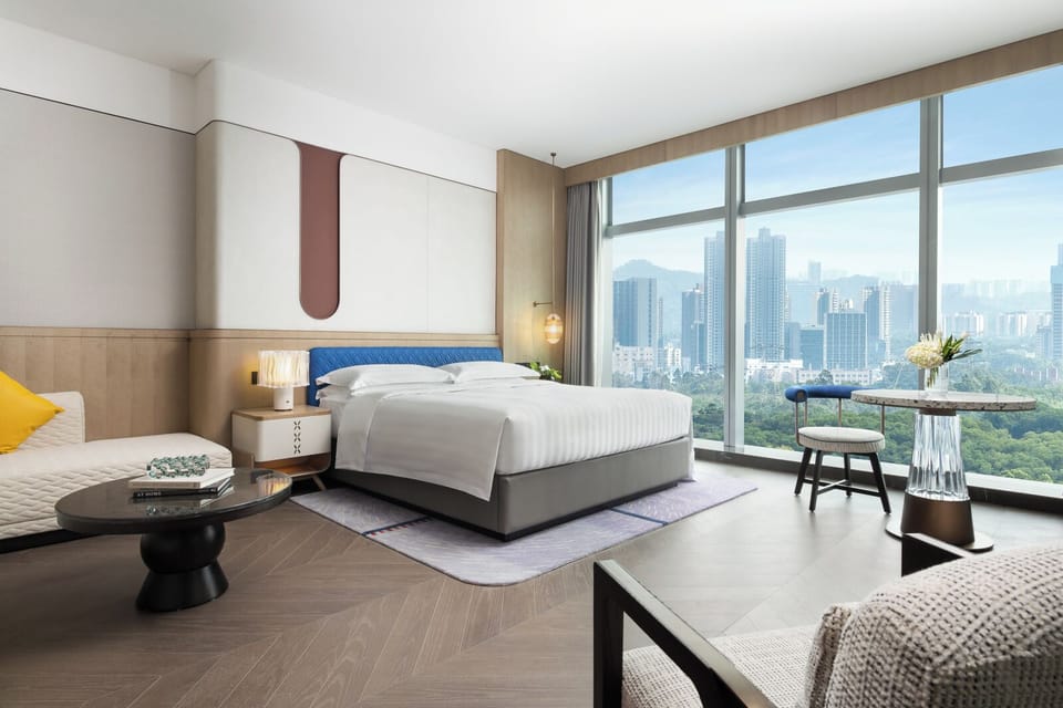 Deluxe Suite, M Lounge Access, 1 King Size Bed, City View | Minibar, in-room safe, individually decorated, individually furnished