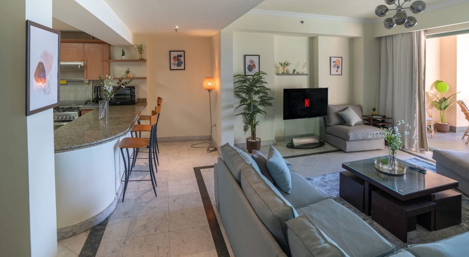 Apartment, 2 Bedrooms, Sea View | Living area | Flat-screen TV