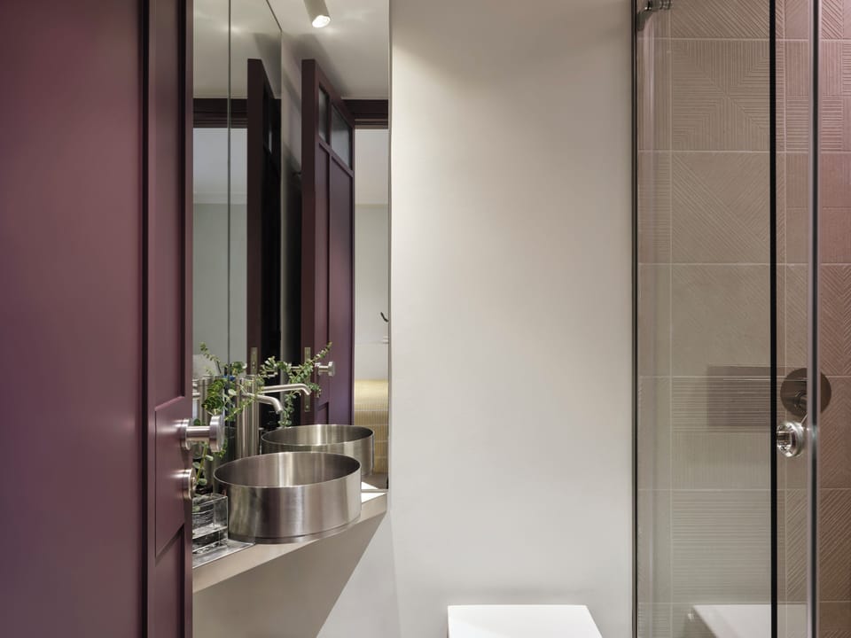 Deluxe Suite Semi-Basement | Bathroom | Shower, towels, soap, shampoo