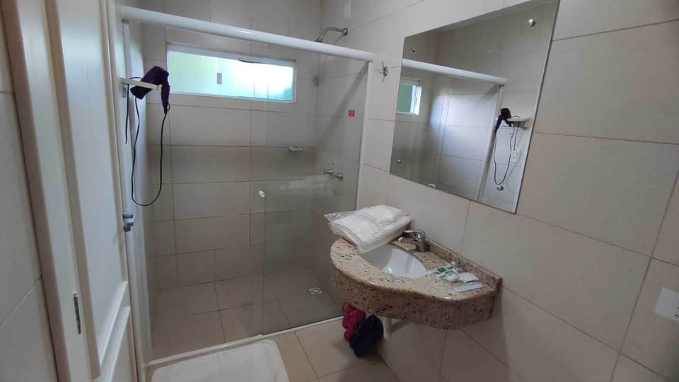 Economy Double or Twin Room | Bathroom | Shower, free toiletries, hair dryer, slippers