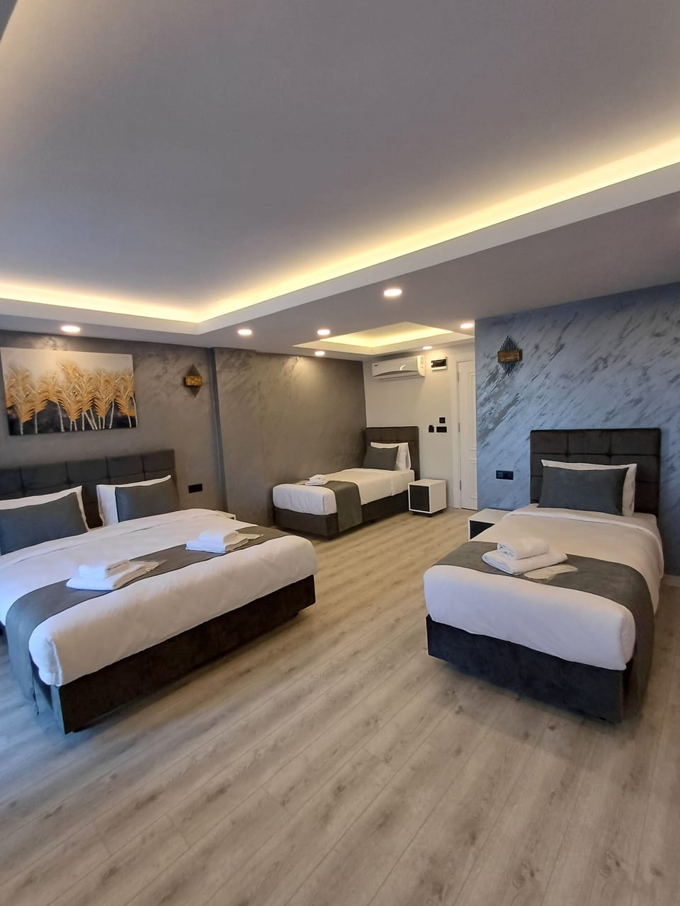 Deluxe Quadruple Room, Sea View | Premium bedding, soundproofing, iron/ironing board, free WiFi