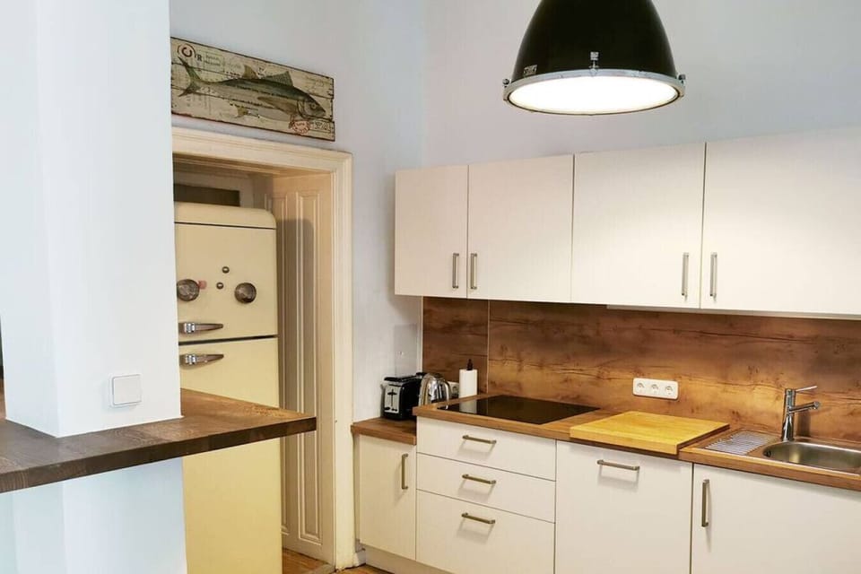 Apartment, City View | Private kitchen | Full-size fridge, microwave, oven, stovetop