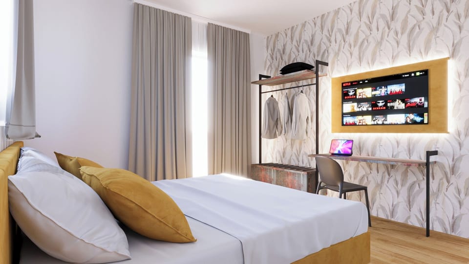 Basic Double or Twin Room | In-room safe, desk, laptop workspace, blackout drapes