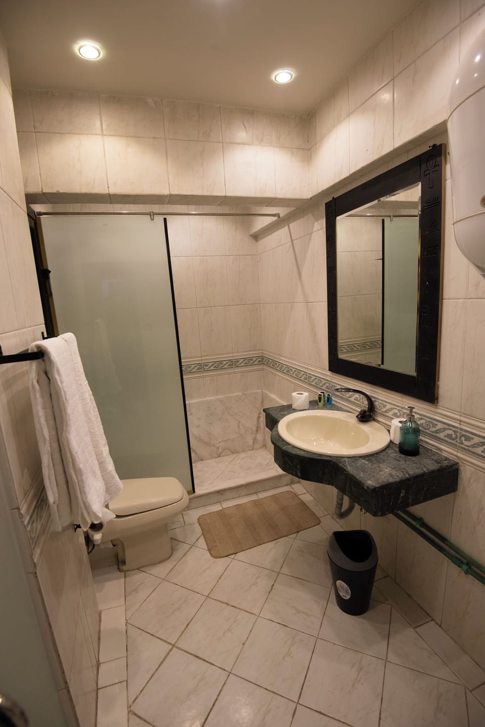 Deluxe Triple Room | Bathroom | Shower, slippers, towels, soap
