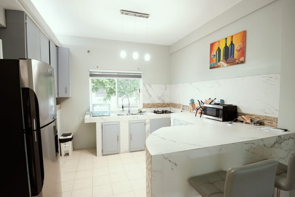 Triple Room, Sea View | Private kitchen | Mini-fridge, microwave