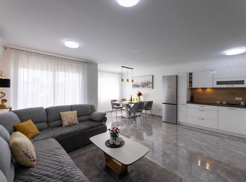 Apartment (One Bedroom Apartment with Terrace) | Living room | 32-inch flat-screen TV with cable channels