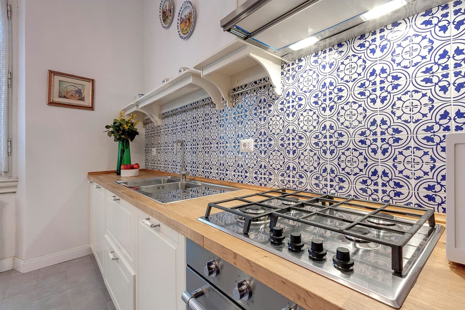 Apartment, Garden View | Private kitchen | Full-size fridge, microwave, oven, dishwasher
