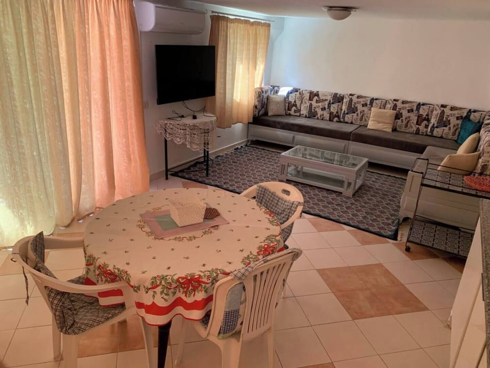 Comfort House | Living area | Flat-screen TV