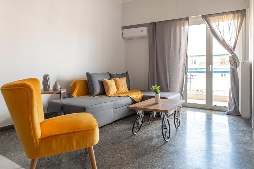 Family Triple Room, Balcony | Living area