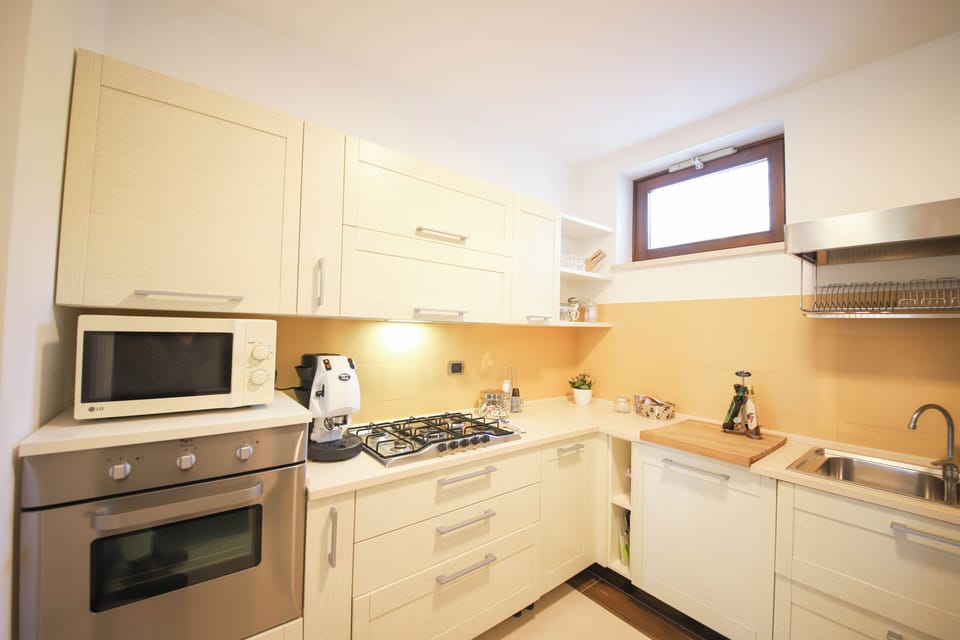 Villa, Partial Sea View | Private kitchen | Fridge, microwave, oven, stovetop