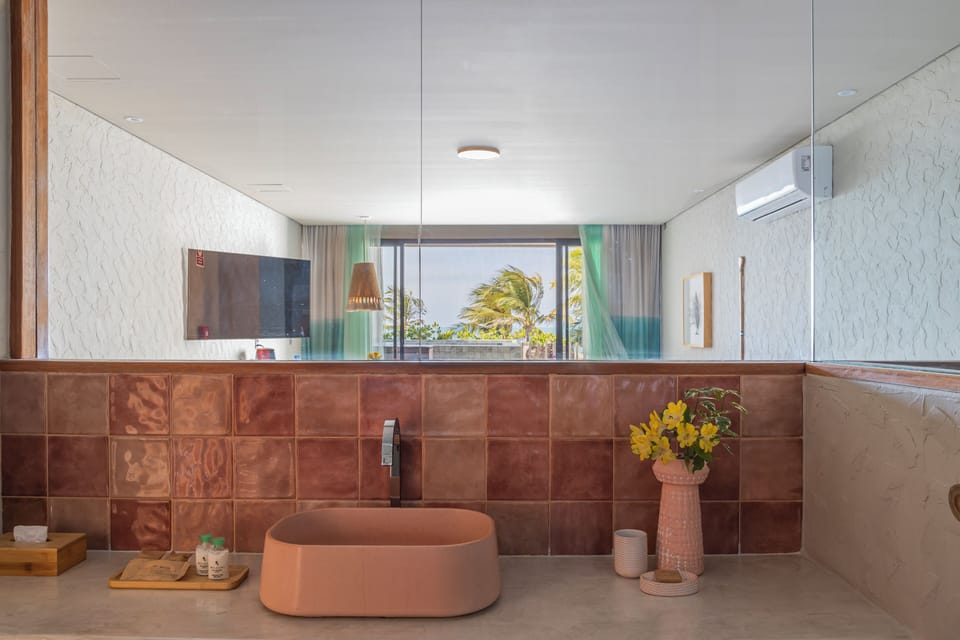 Eolo Partial Sea View | Bathroom | Shower, designer toiletries, hair dryer, bathrobes