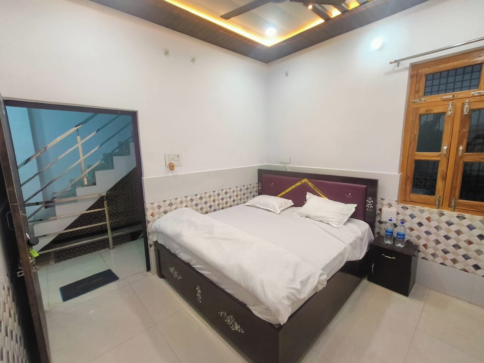 Deluxe Double Room, City View | In-room safe, desk, laptop workspace, blackout drapes