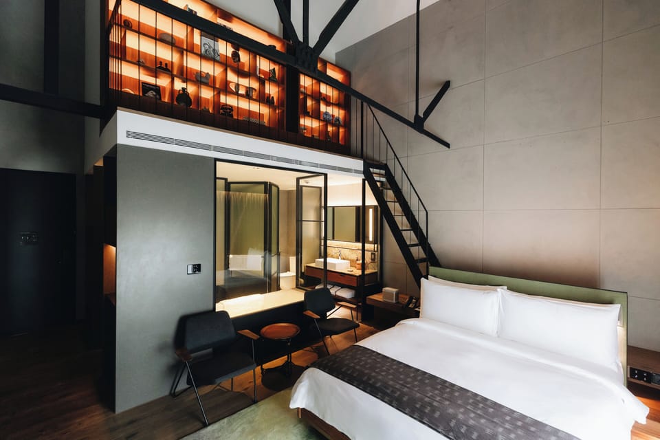 Room, River View, Mezzanine | Minibar, in-room safe, desk, blackout drapes