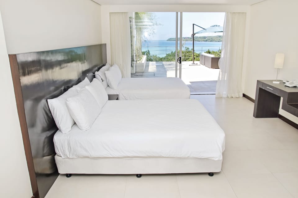 Premier Triple Room | Minibar, in-room safe, desk, laptop workspace