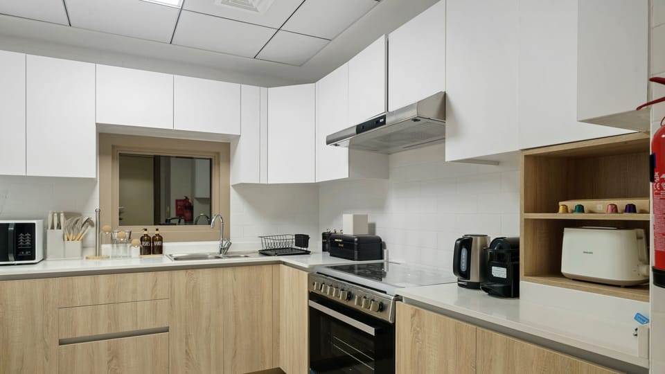 Luxury Apartment, Balcony, Canal View | Private kitchen | Fridge, oven, stovetop, dishwasher